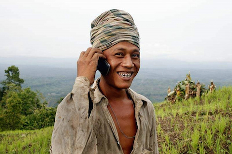 Farmer in Bangladesh using mobile phone.