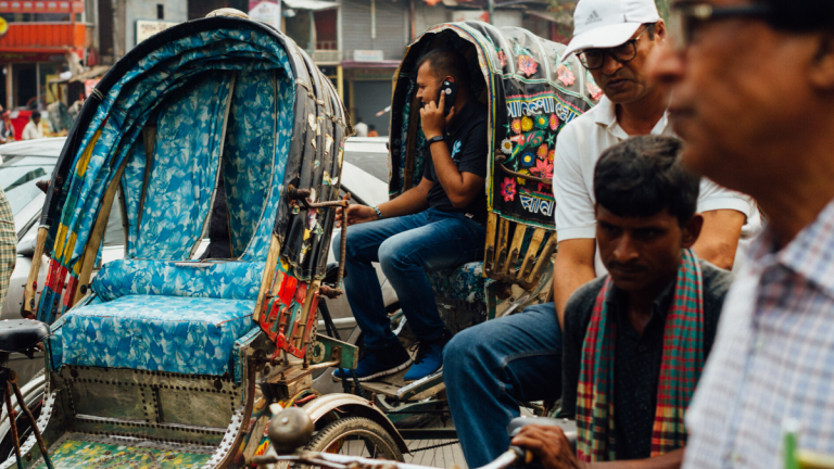 Talking on Mobile Phone in Rickshaw, Chittagong Bangladesh