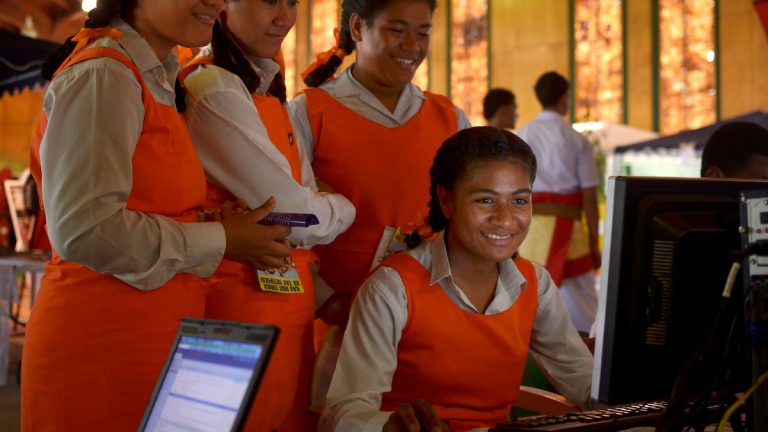 Photo of young women using computer